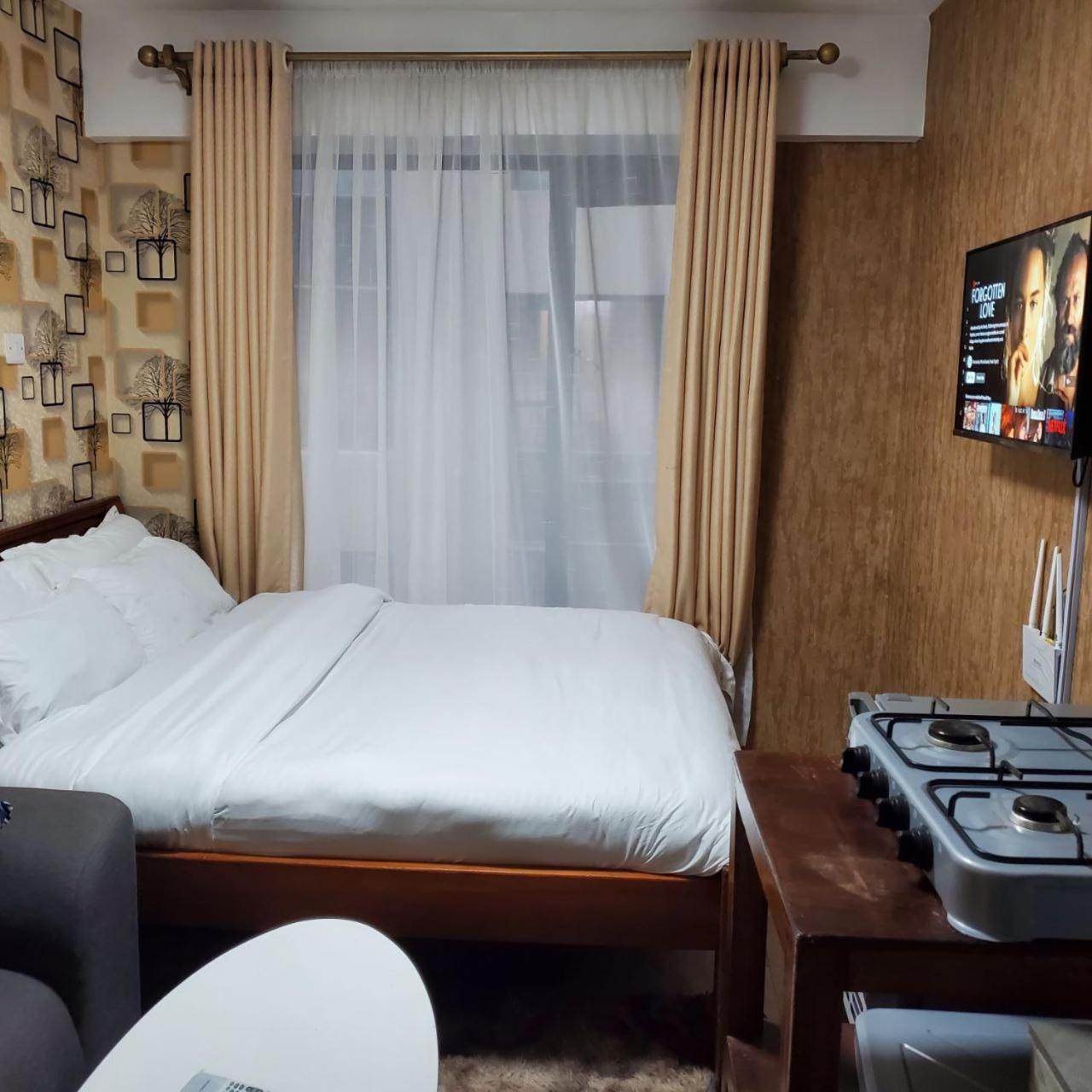 Lovely & Cozy Compact Studio Near Airport With Rooftop View Apartment Nairobi Exterior photo
